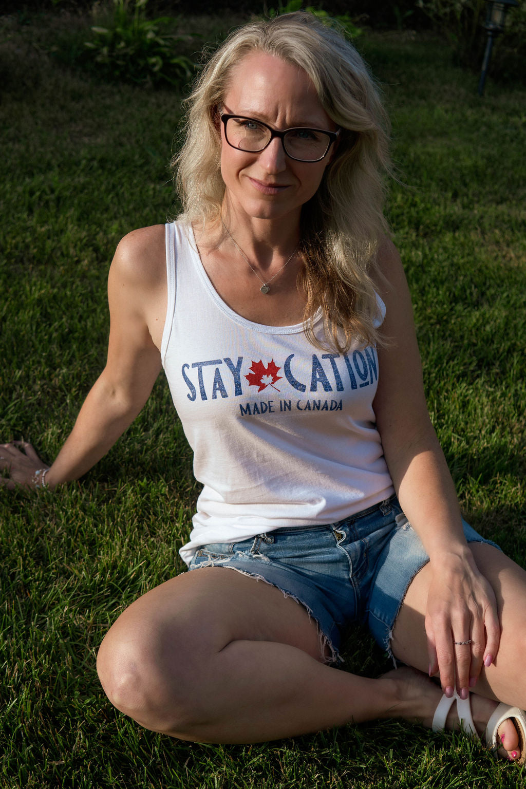 woman wearing the staycation tank top