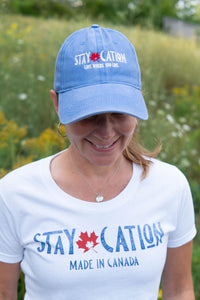 woman wearing the staycation white t-shirt